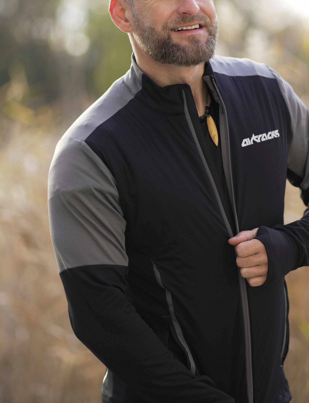 airtracks-pro-line-maillot-running-homme-hiver-noir-gris-zipp image 4